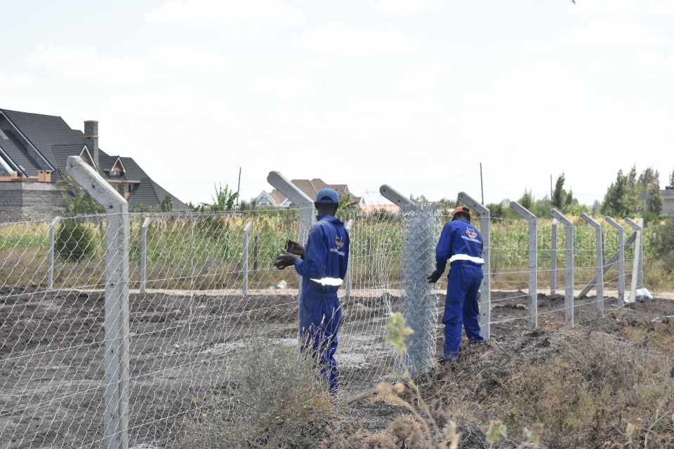 Concrete post chainlink wire fencing
